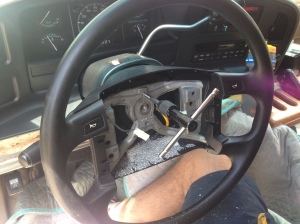 Removing Hulk's steering wheel to replace the clock spring.